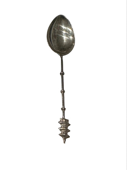 Sterling silver pagoda demitasse spoon, full view with bamboo-segment handle and pagoda finial.