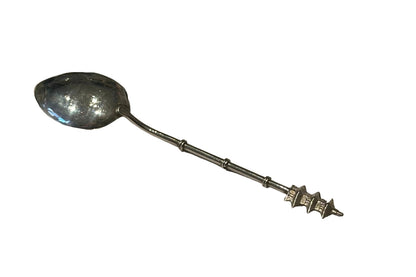 Sterling silver pagoda demitasse spoon, diagonal full view of the bamboo-segment handle and pagoda finial.
