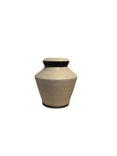 Studio-made white stoneware medium vessel, distant full view, speckled body.