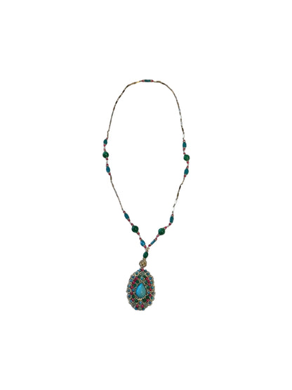 Pendant necklace with turquoise teardrop centerpiece on a beaded chain of green, red and turquoise stones