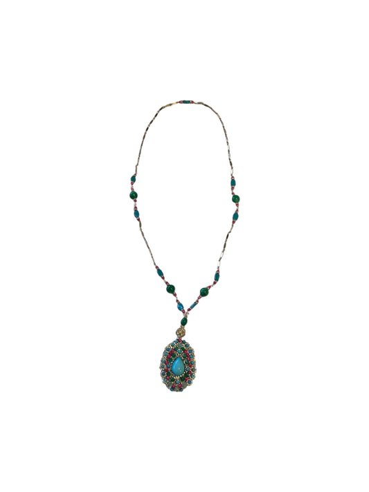 Pendant necklace with turquoise teardrop centerpiece on a beaded chain of green, red and turquoise stones