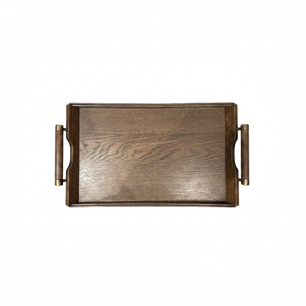Small mid-century wooden serving tray with brass-trimmed handles, top view