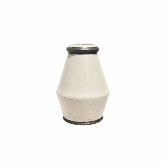 Studio-made white stoneware tall vessel, speckled body with dark glazed rim and base, front view.
