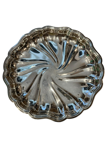 Vintage fluted silverplate serving dish, angled top view of swirled pinwheel fluting