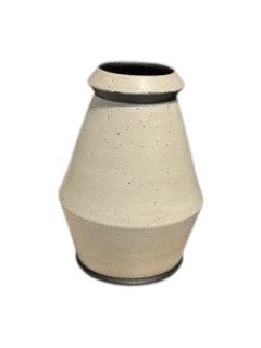 Studio-made white stoneware tall vessel, front view, conical form with dark rim.