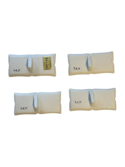 Underside view of porcelain place card holders with 6431 numbering and Made in Japan sticker