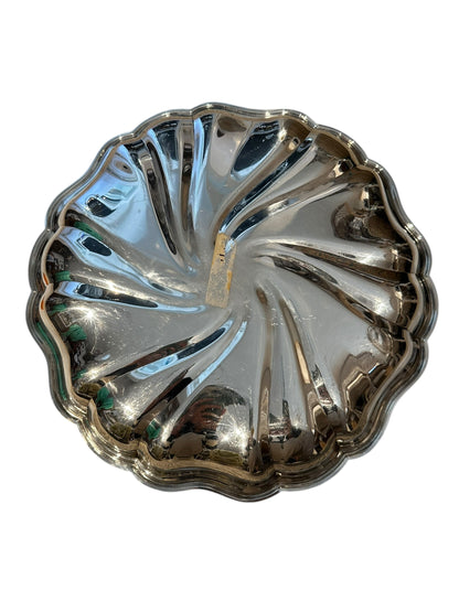 Vintage fluted silverplate serving dish, angled view of swirled fluting and scalloped rim