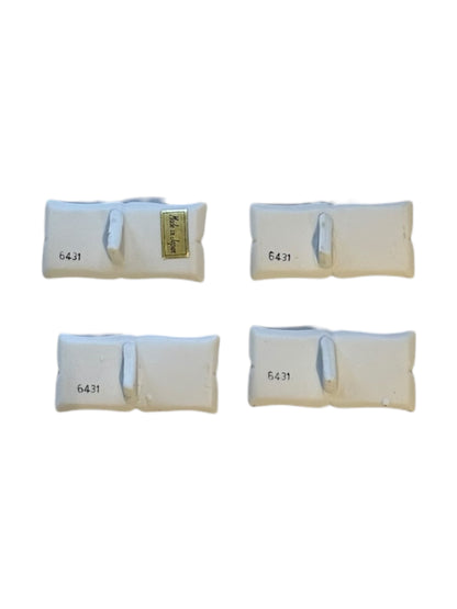 Underside of the floral place card holders showing the 6431 mark and Made in Japan label