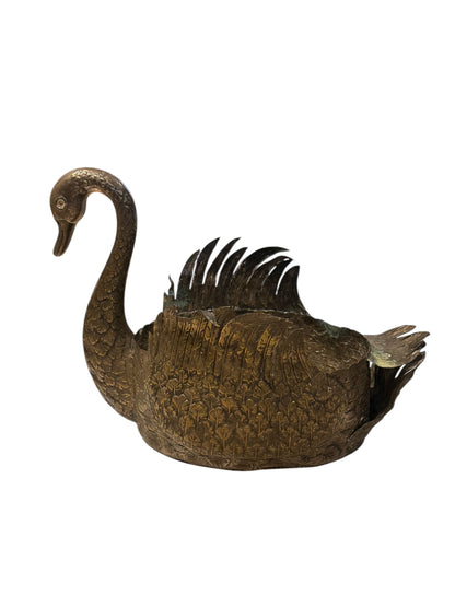 Silver-plated swan jardiniere, left-side view showing raised wing feathers and engraved plumage