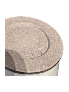 Close-up of white stoneware vessel's shoulder with engraved maker's mark on speckled glaze.