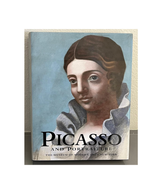 Picasso and Portraiture exhibition book, Museum of Modern Art New York, cover with a Picasso portrait of a woman.
