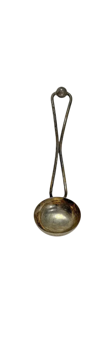A vintage sterling silver ladle or spoon with a long loop wire handle ending in a small ball, shown on a plain white background.