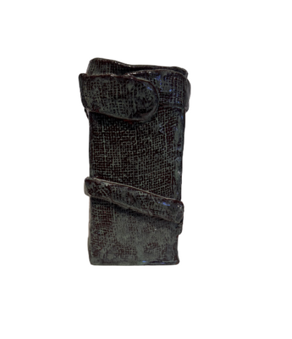 Vintage rectangular ceramic vase with a dark greenish-gray and burgundy glaze, textured crosshatched surface, and raised ceramic bands wrapping around the body. Features an irregular square opening, glossy interior, and unglazed reddish-brown base with an incised maker's mark