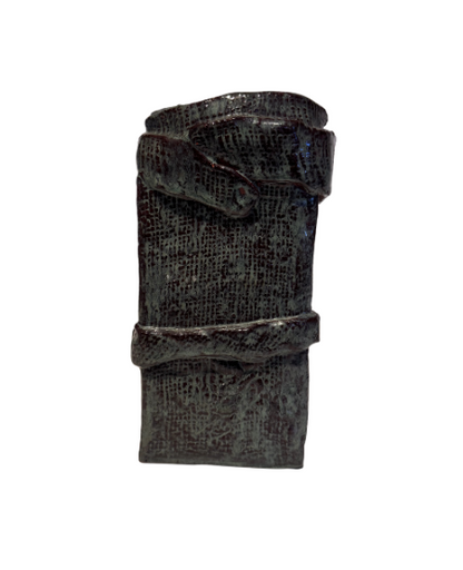 Vintage rectangular ceramic vase with a dark greenish-gray and burgundy glaze, textured crosshatched surface, and raised ceramic bands wrapping around the body. Features an irregular square opening, glossy interior, and unglazed reddish-brown base with an incised maker's mark