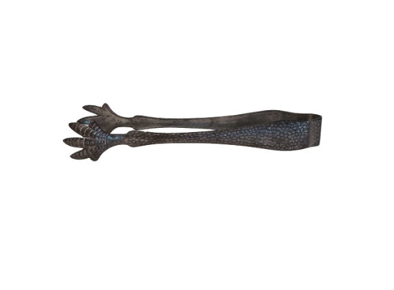 The matching metal ice tongs feature textured arms ending in three-pronged bird claw shapes. The bucket's interior has a hammered texture with visible darkening and discoloration at the bottom.