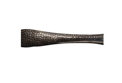The matching metal ice tongs feature textured arms ending in three-pronged bird claw shapes. The bucket's interior has a hammered texture with visible darkening and discoloration at the bottom.