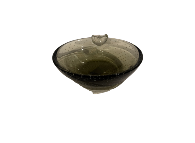 Vintage smoky gray-green glass ashtray with a rounded bowl, evenly spaced controlled bubbles, dark glass rim, and a single clear sculptural cigarette rest.
