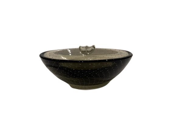 Vintage smoky gray-green glass ashtray with a rounded bowl, evenly spaced controlled bubbles, dark glass rim, and a single clear sculptural cigarette rest.