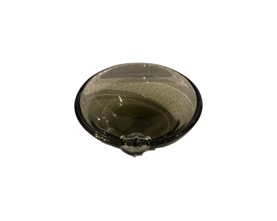 Vintage smoky gray-green glass ashtray with a rounded bowl, evenly spaced controlled bubbles, dark glass rim, and a single clear sculptural cigarette rest.