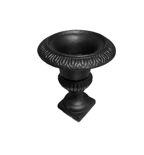 Small black cast iron Neoclassical-style urn featuring a wide flared rim with raised decorative detailing, a tapered body, ribbed lower section, and a stepped square pedestal base. Measures 4.25 inches in diameter and 5 inches tall