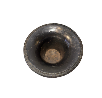 Top View, Black faux-bronze Neoclassical Medici urn with green patina accents, measuring 11 inches tall and 9 inches in diameter. The Campana-shaped vessel features a wide flared rim with egg-and-dart detailing, raised Greco-Roman figures in various poses, grapevine and leaf borders, and two reeded loop handles with bearded mask decorations. An intricate floral and acanthus leaf design surrounds the lower bowl, which rests on a fluted circular pedestal base.