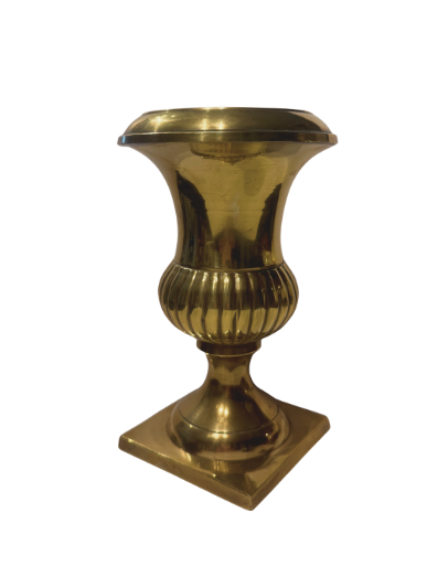 Close-up front Side view of a polished brass decorative urn featuring a wide flared rim, narrow tapered neck, vertically fluted lower body, and pedestal stem resting on a square base. The gold-tone surface shows light scratches and natural patina.


