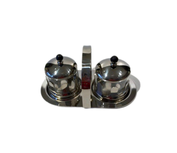 Front view of the 1990s Michael Graves chrome and glass creamer and sugar set with central carrying handle.