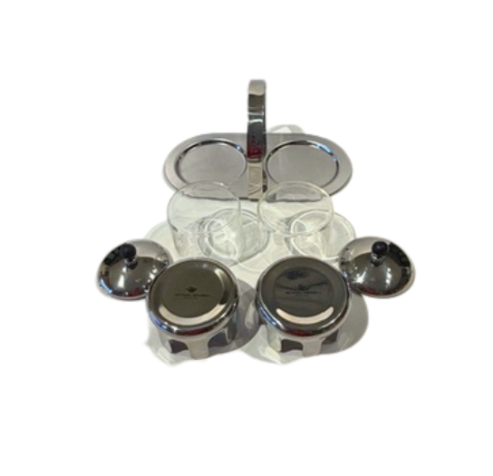 Overhead view of the Michael Graves oval chrome serving caddy and matching cream and sugar containers.
