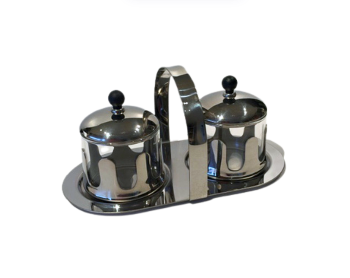 Angled view of the complete Michael Graves cream and sugar set highlighting its polished chrome finish and black resin details.