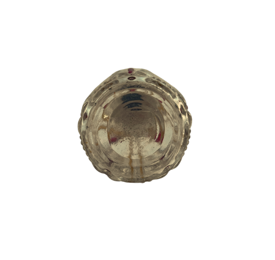 Top view of the Baccarat crystal perfume bottle showing the faceted base with red accents