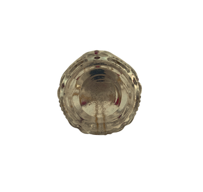 Top view of the Baccarat crystal perfume bottle showing the faceted base with red accents