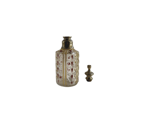 Baccarat crystal perfume bottle with its stopper removed and set beside it