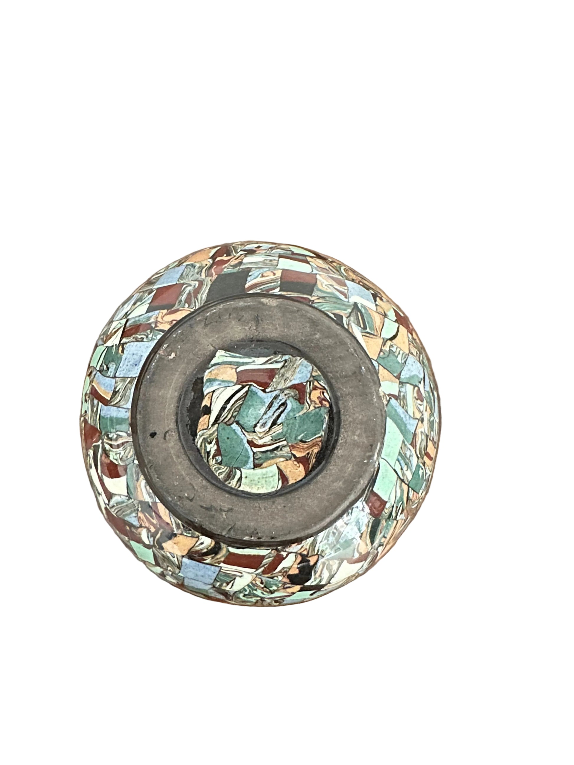 Underside of the spherical mosaic vase showing the unglazed base and tile pattern