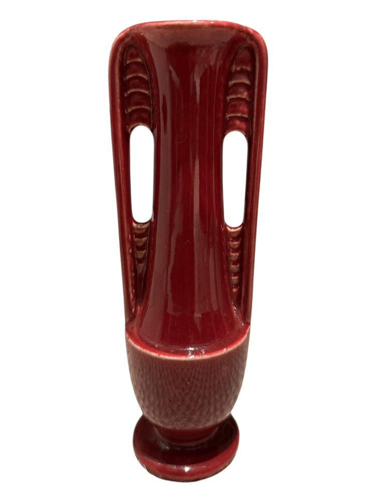 Vintage Shawnee burgundy vase, view showing the open pierced side handles