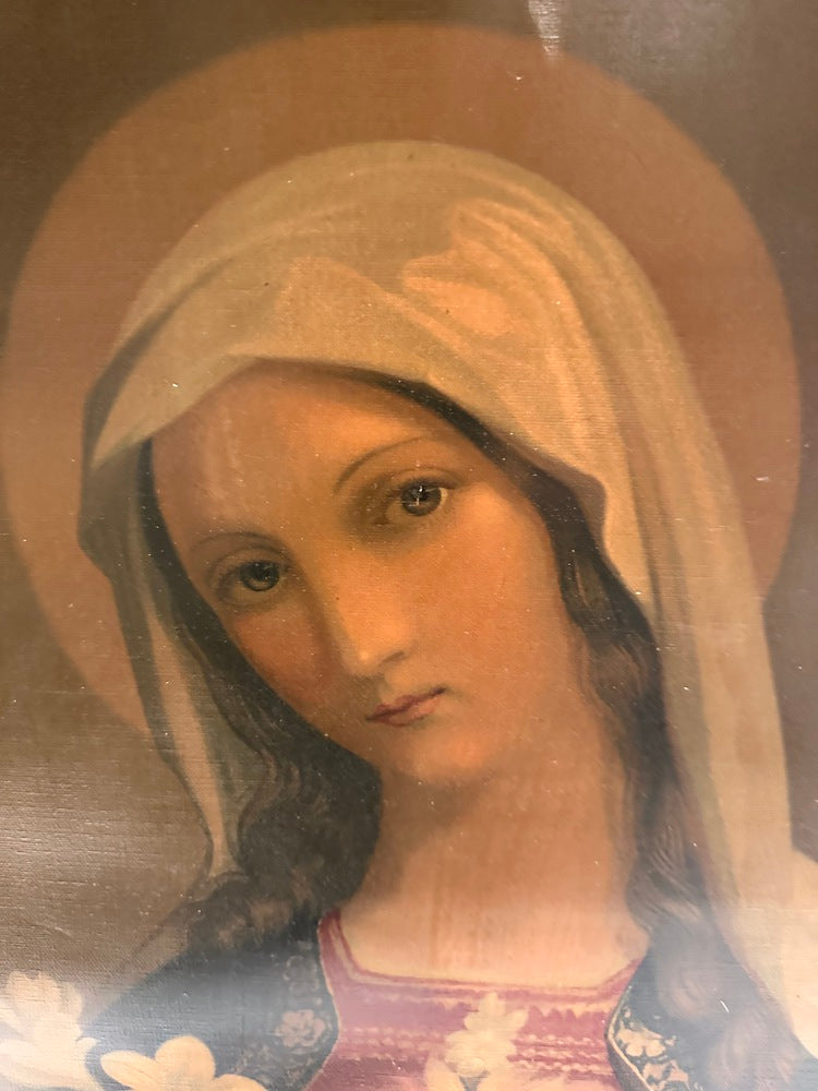 Close-up of the Immaculate Heart of Mary painting showing Mary's veiled face and halo