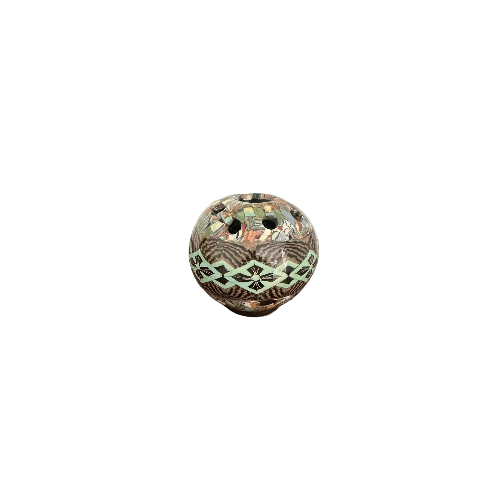 Front view of the spherical mosaic flower-frog vase with green diamond and dark floral pattern