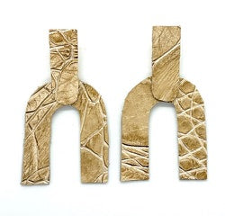 Artisan recycled leather earrings, gold-wash arch shape with tooled pattern, pair.