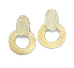 Artisan recycled leather earrings, pale gold-wash oval stud and open flat-hoop drop.