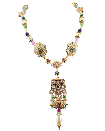 Mughal Indian beaded necklace with jeweled pendant, green bead drops and pearl tassel, on white