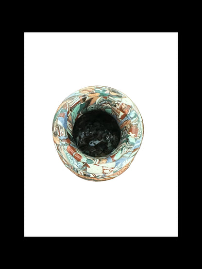 Top-down view into the narrow mouth of the Jean Gerbino mosaic vase